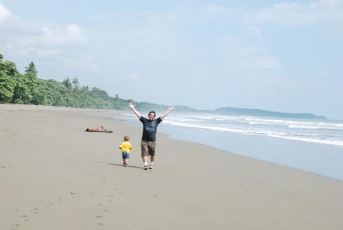 Todd with Lucas on deserted beach in Costa Rica